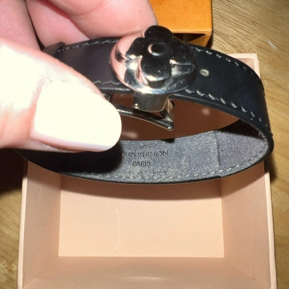 Louis Vuitton black adjustable monogram bracelet.